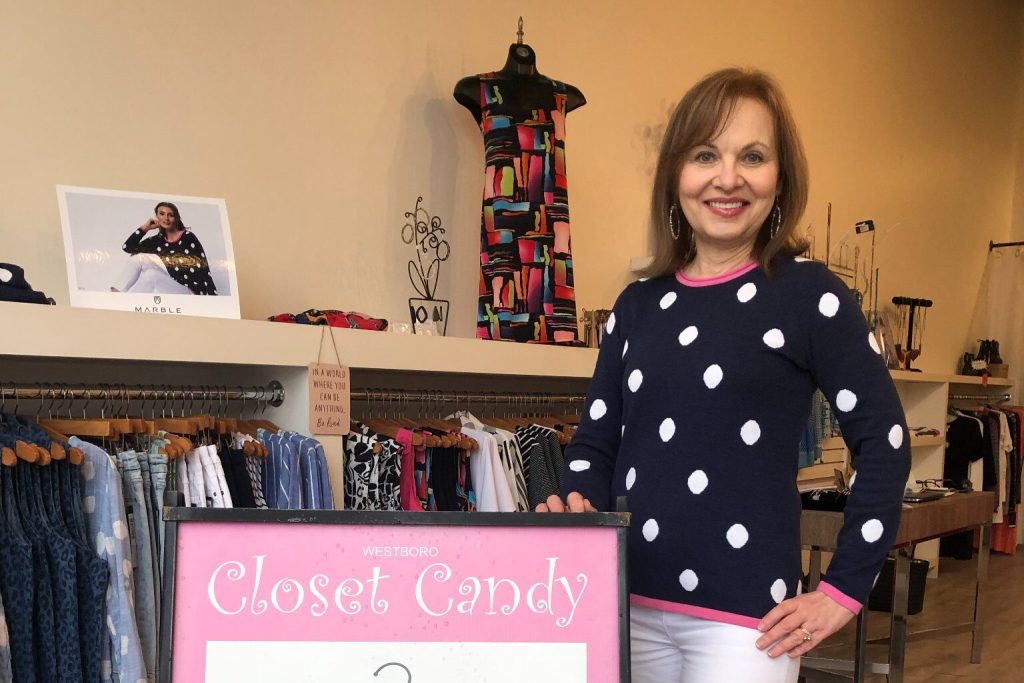 Store owner with in store display