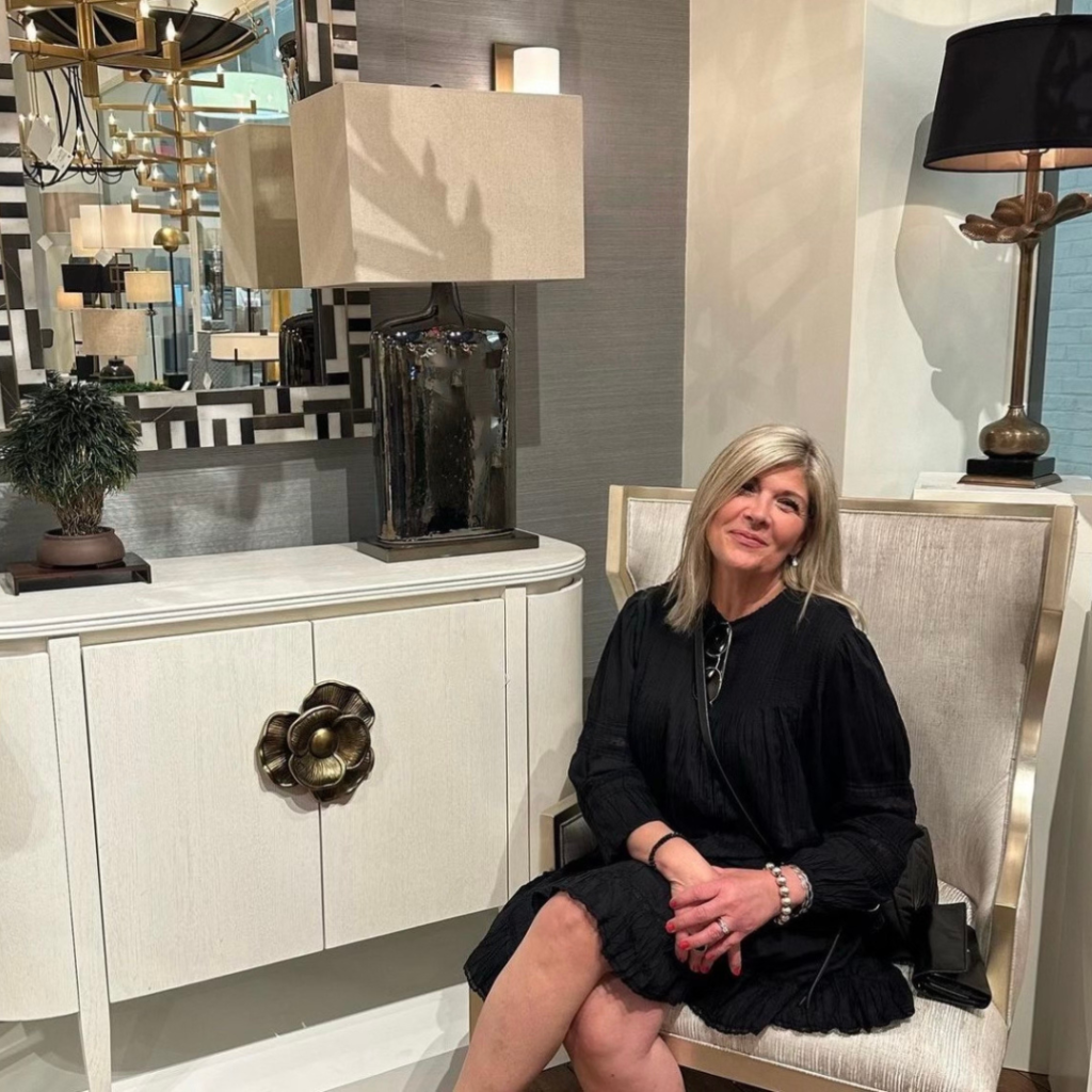 Mandy Renfrew, owner of Polanco Home Furniture and interior design in Ottawa, sits in the shop in Westboro
